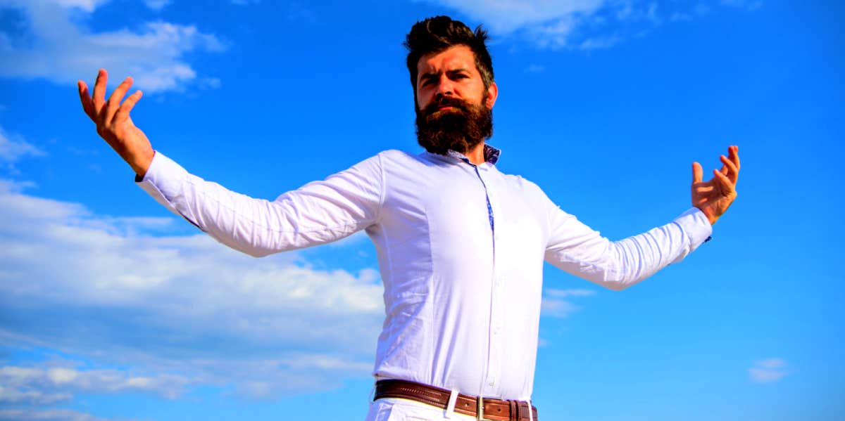 10 Signs Your Husband Is A Narcissist — And How To Cope narcissistic man standing with arms outstretched