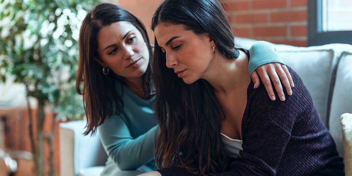 friend comforting woman