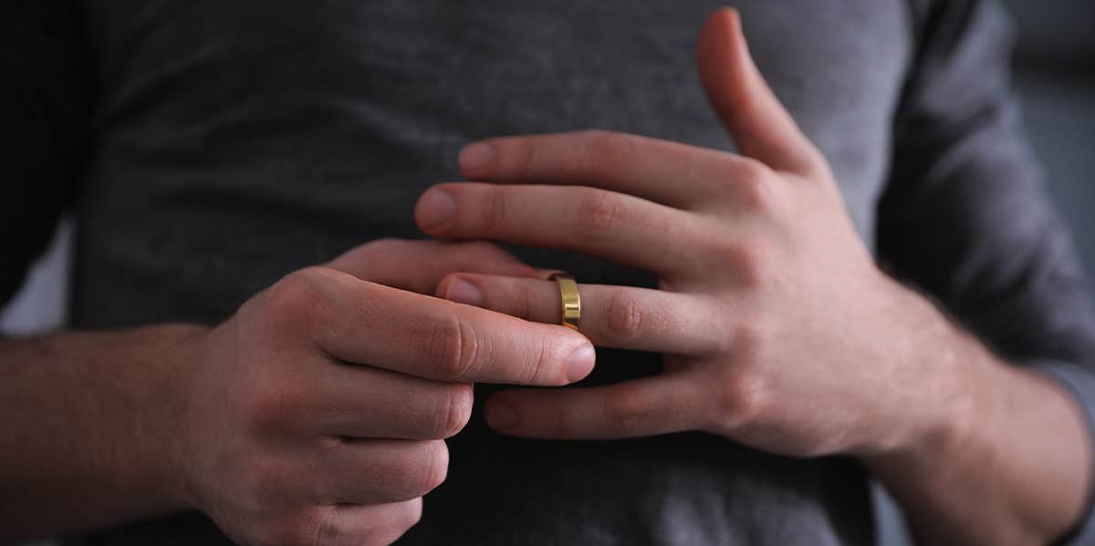 I’ve Been Cheating On My Wife For 10 Years And It’s Made Me A Better Husband man taking off ring