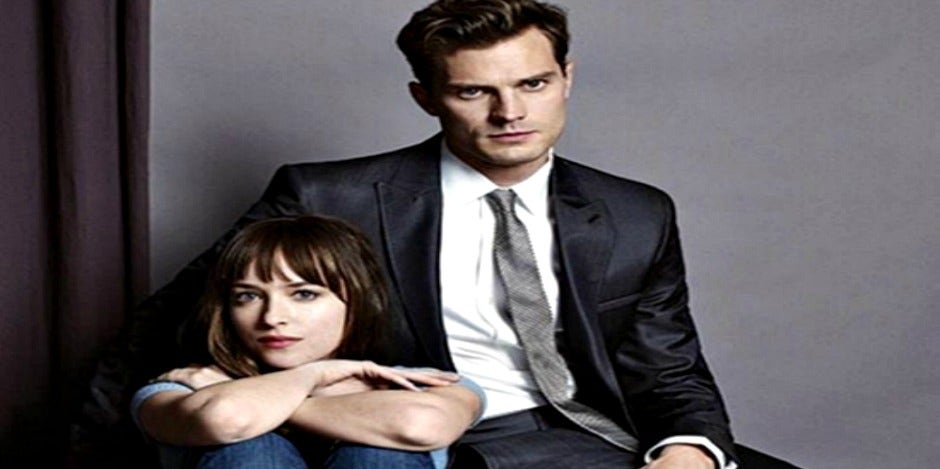 Dakota Johnson as Ana Steele and Jamie Dornan as Christian Grey for 'Fifty Shades Of Grey,' the '50 Shades Of Grey' movie, in Entertainment Weekly