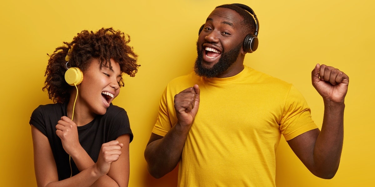 man and woman listening to music 