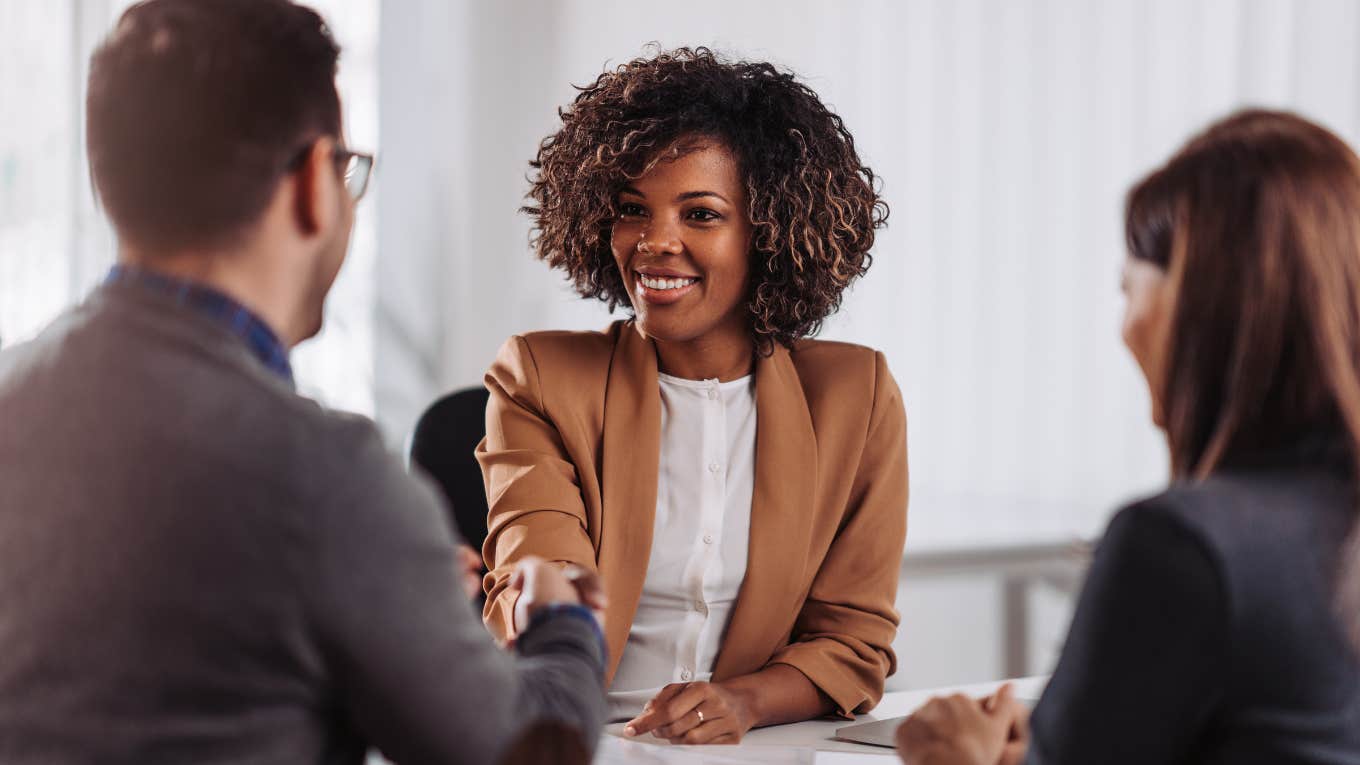 Business people shaking hands after meeting