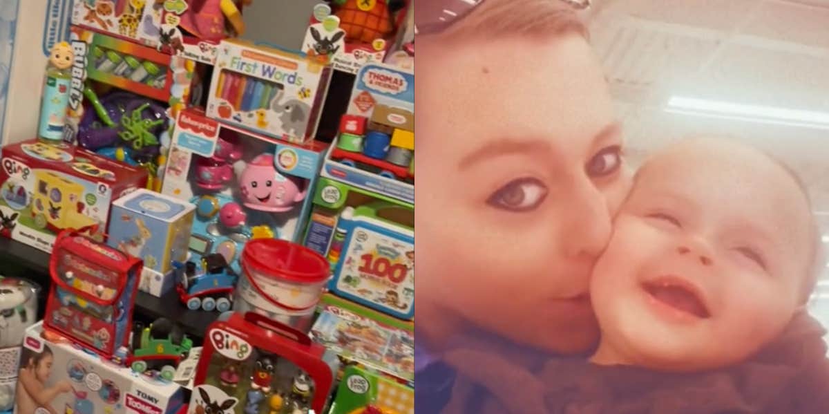 Sarah Bouasker and her baby Alaya beside a stack of Christmas gifts