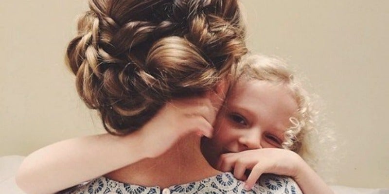 mom & daughter hugging mom & daughter hugging