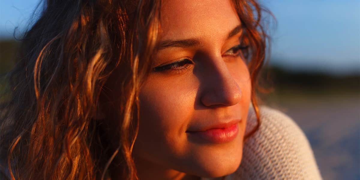 woman sitting in sunset