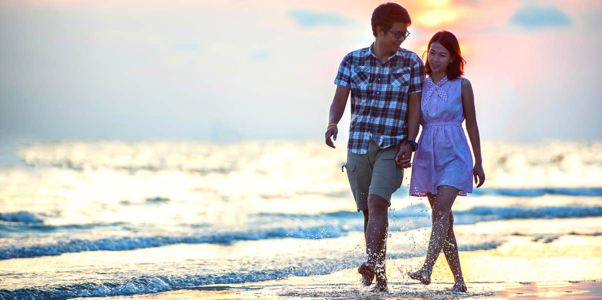 couple walking on beach