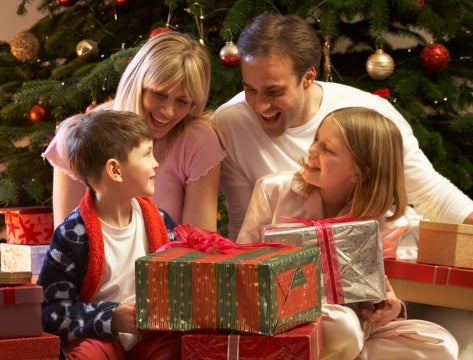 Kids opening Christmas gifts