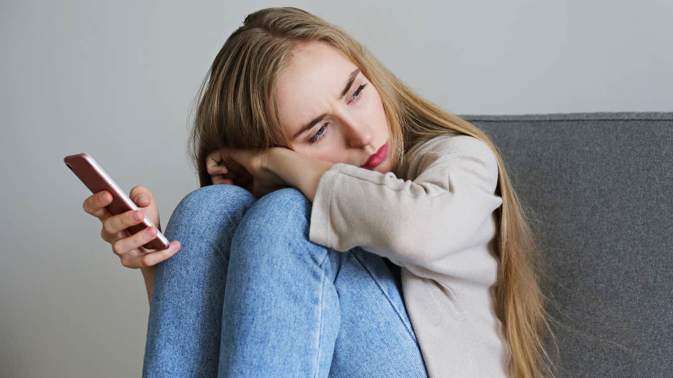 depressed woman on phone