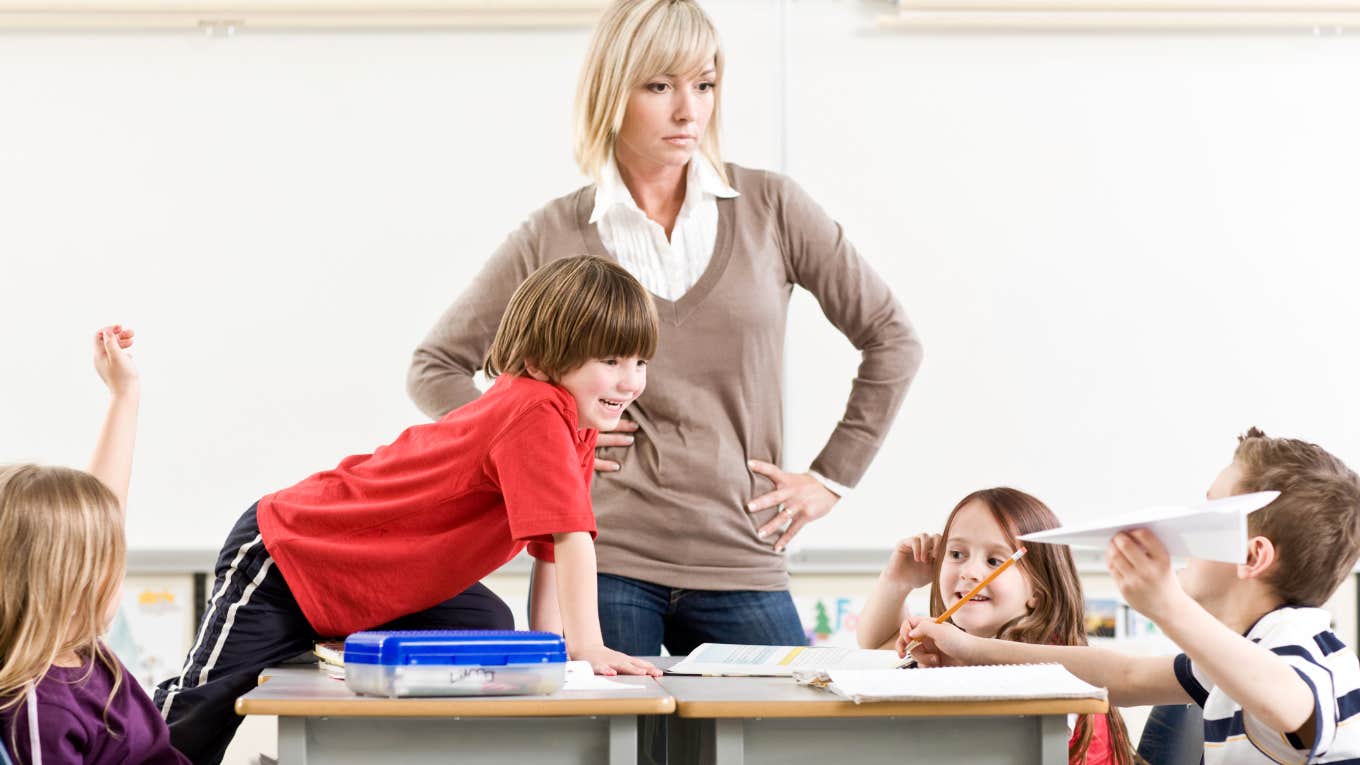 teacher struggling to manage misbehaving students