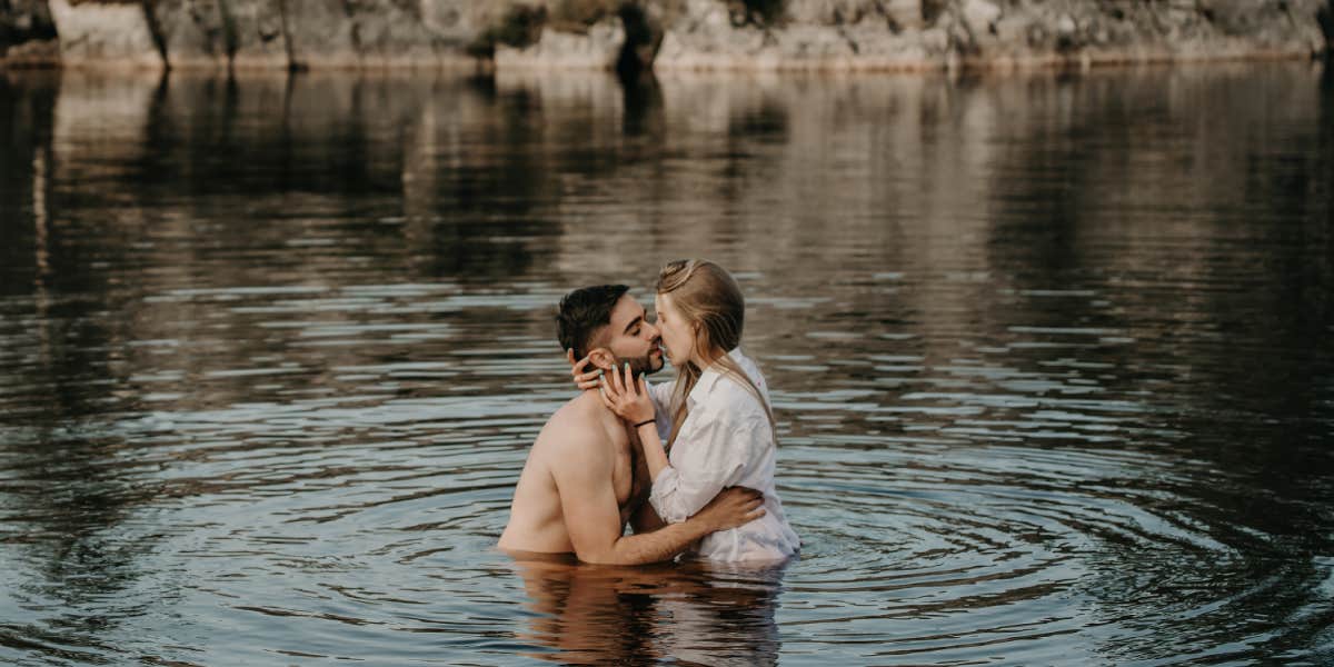 couple in a natural gully kissing