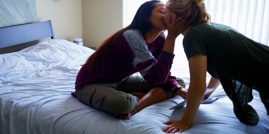 man and woman kissing