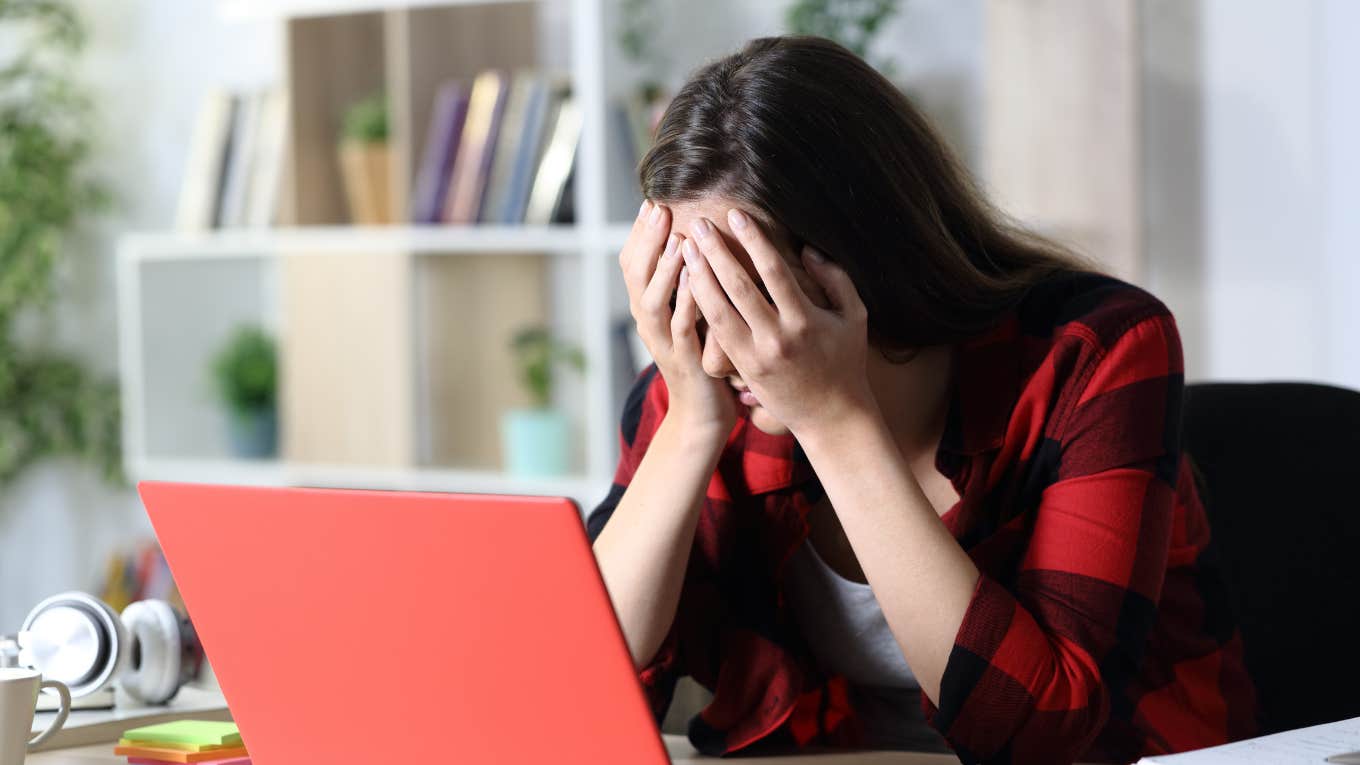 teacher, sad, at desk