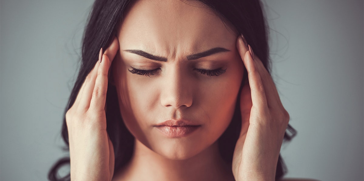 Do You Have Leaky Brain Syndrome? woman holding head