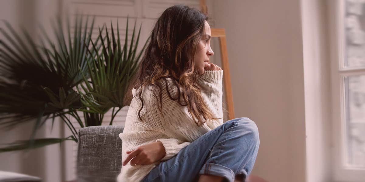 Leaving My Marriage Was a Death My Body Remembers woman that looks sad