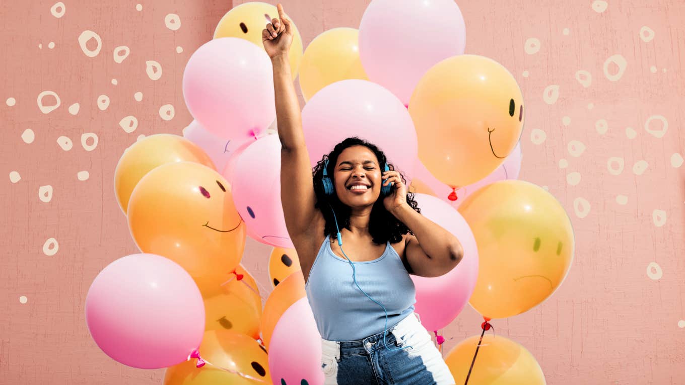 Woman enjoying life, happily dancing 