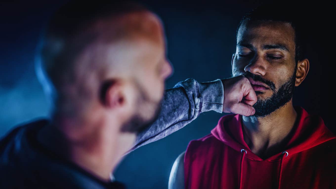 man being punched in the face