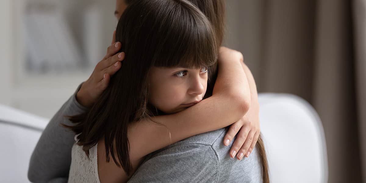'Kids Are Resilient' And 7 Other Lies Divorcing Parents Believe parent hugging child
