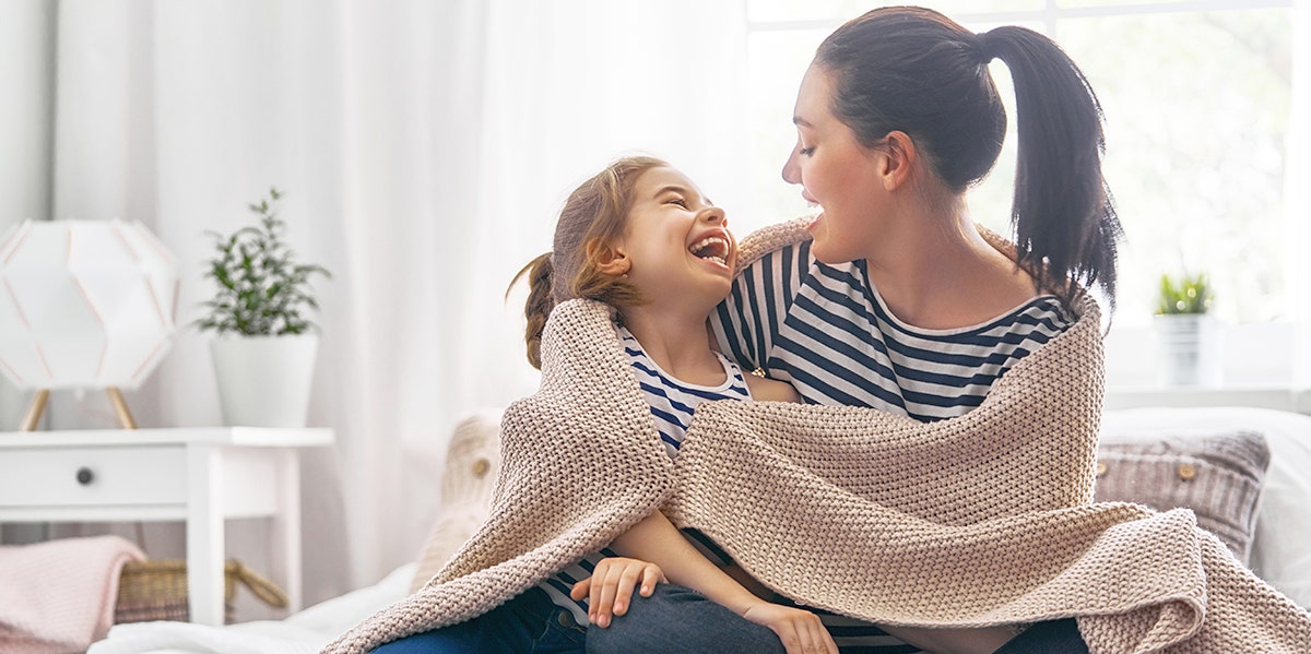 mom daughter laughing