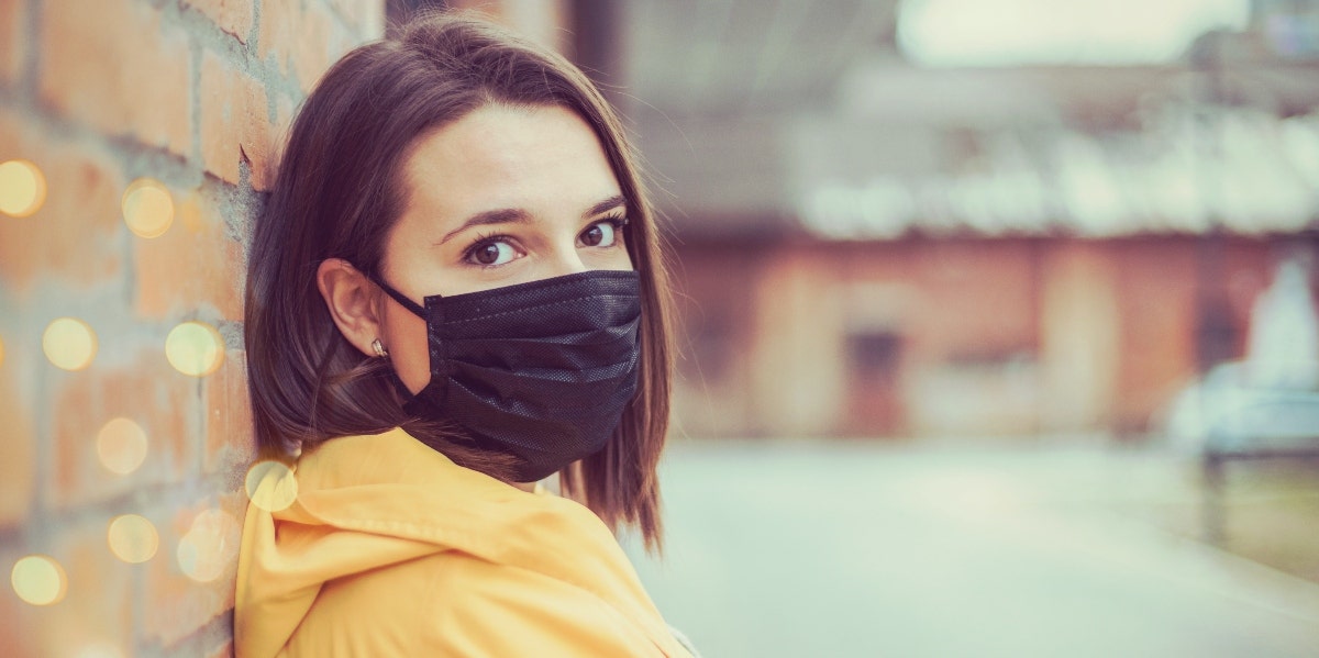 woman wearing a face mask outside