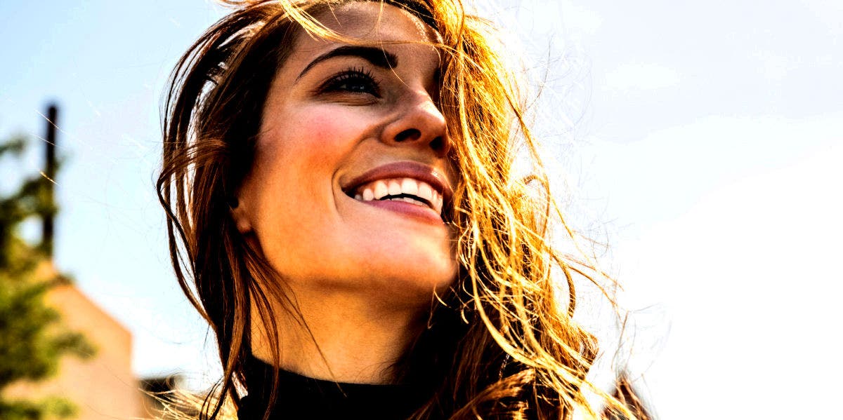 Life Path Number 8 Meaning, According To Numerology smiling woman