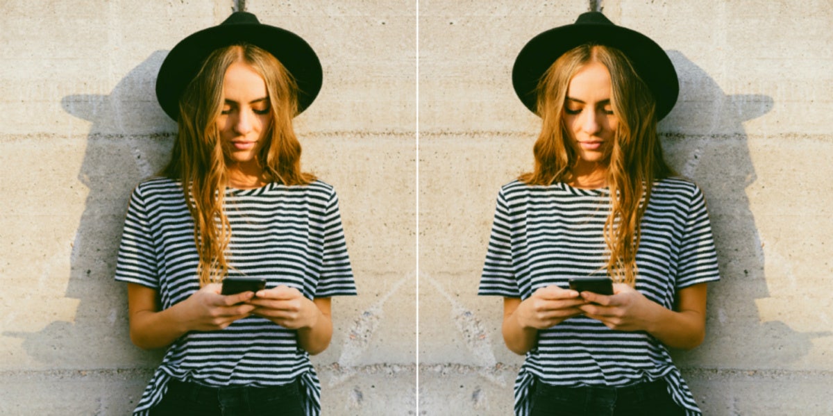 sad woman looking at phone