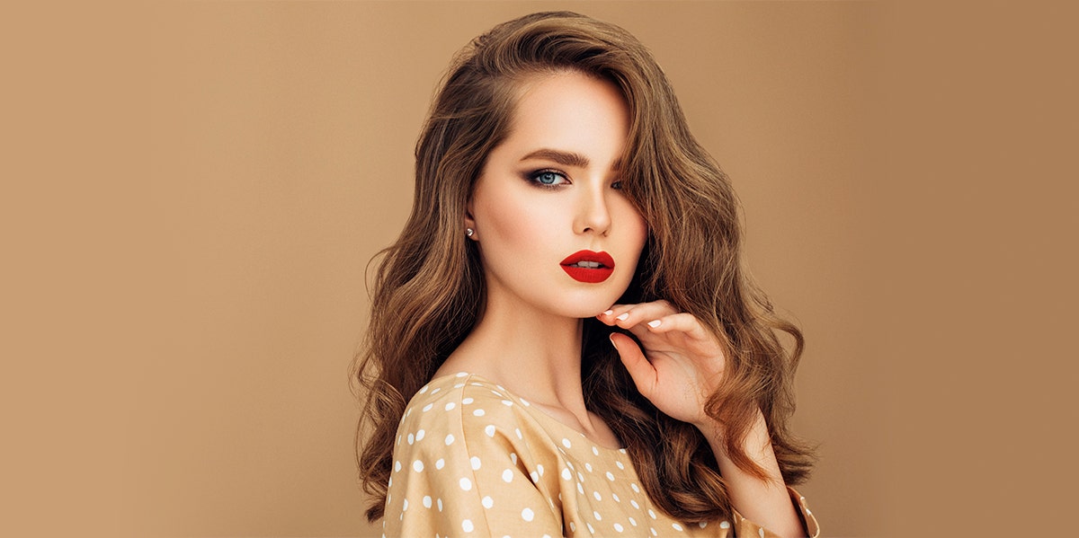 What Your Lipstick Shade Secretly Says About Your Personality woman wearing lipstick