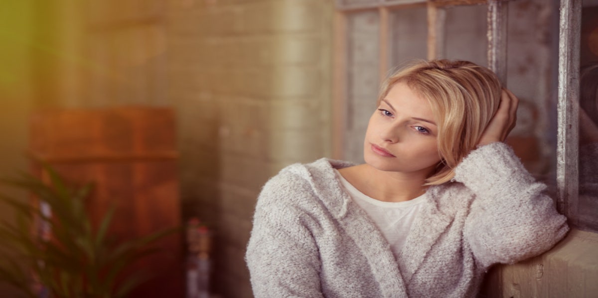 serious woman sitting down