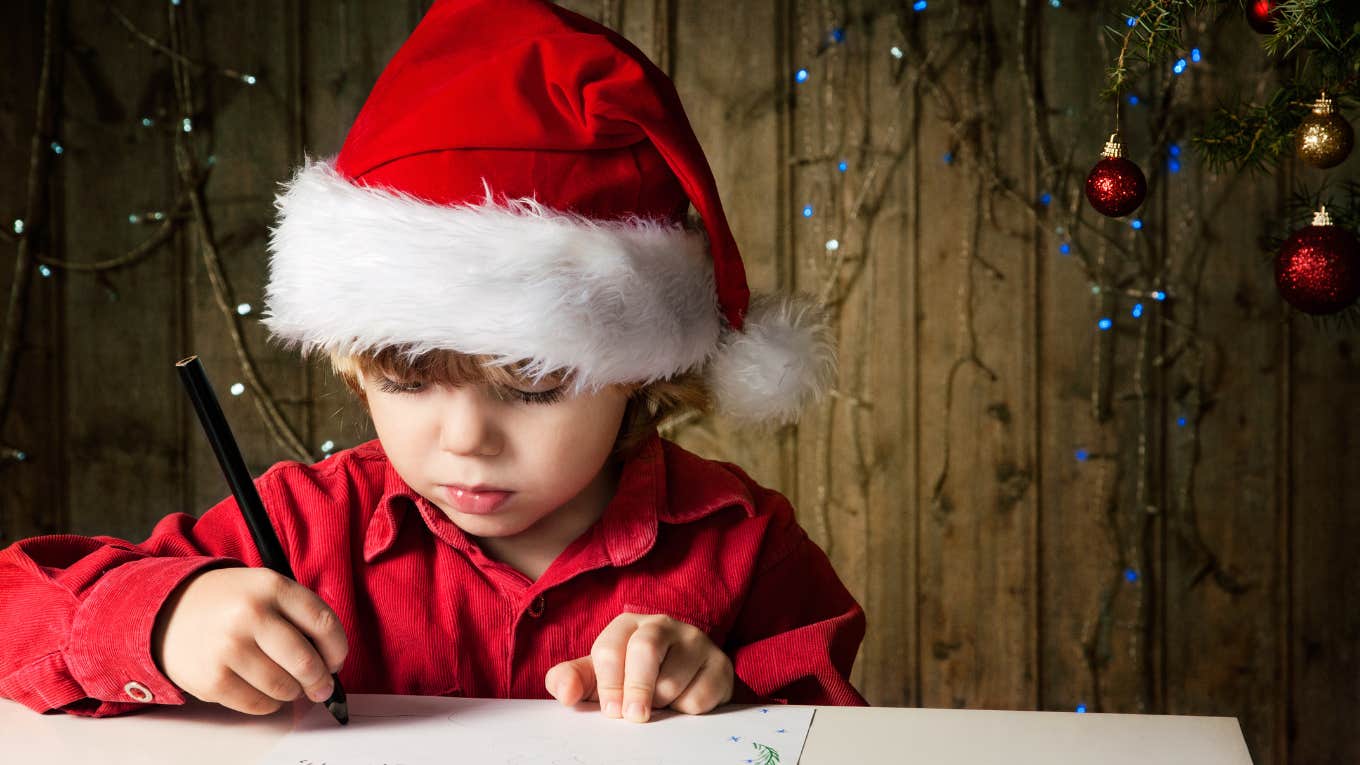 little boy writing letter to santa