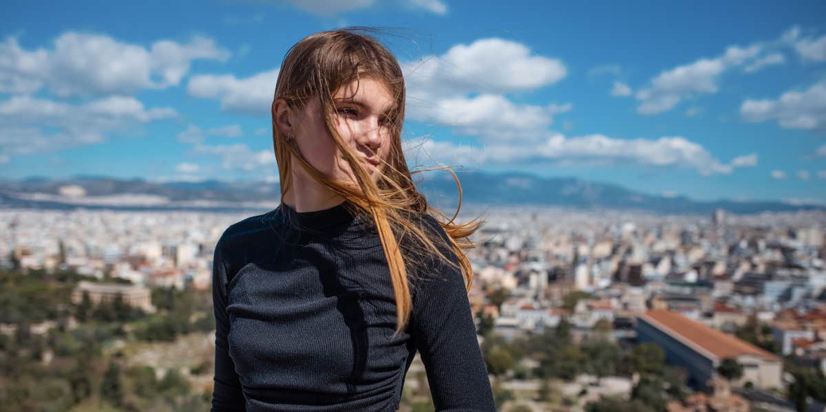 womans hair blowing in the wind 