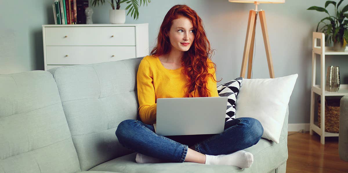 woman thinking with on the couch 