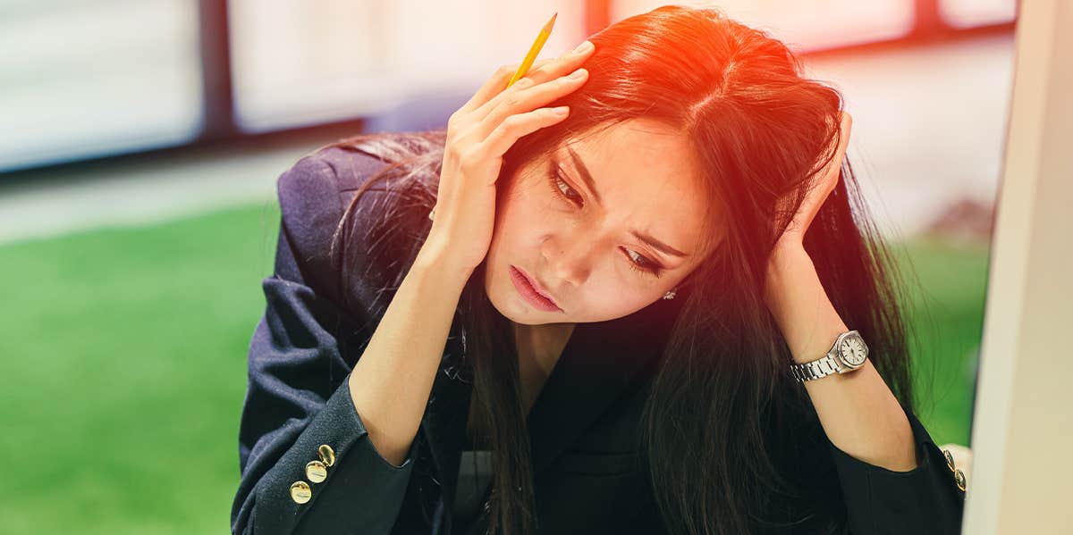 How Losing My Job Made Me Reevaluate The Kind Of Life I Want upset woman