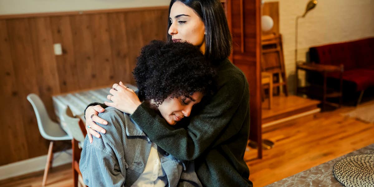 friend comforting grief