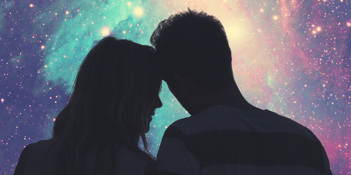 couple cuddling under the stars