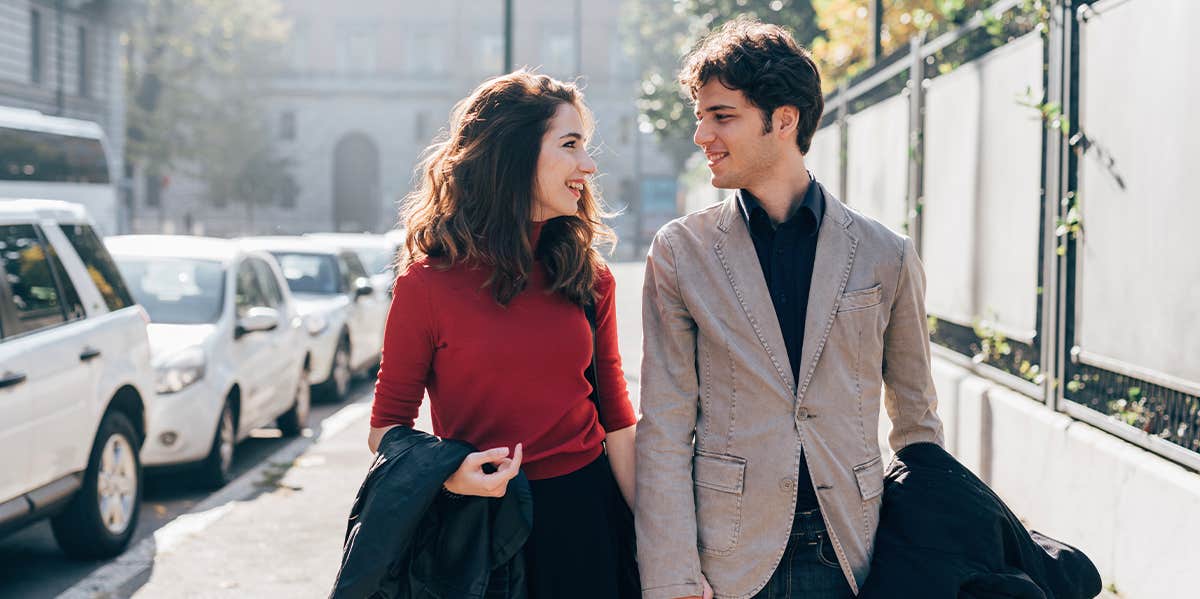 man and woman walking together