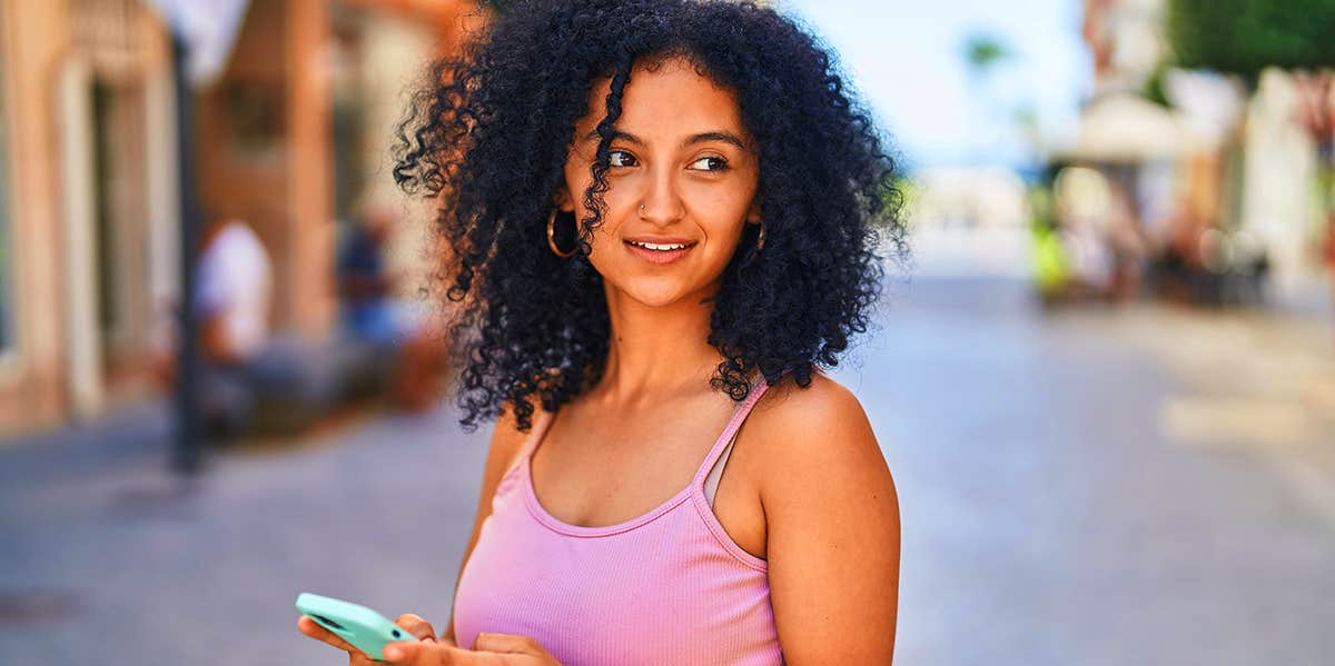 woman texting on phone