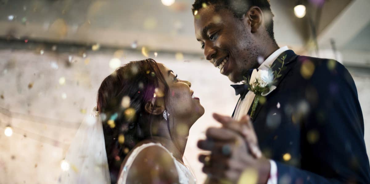 The Newlywed Catch-22: Why The First Year Of Marriage Is So Tough man and woman standing at altar
