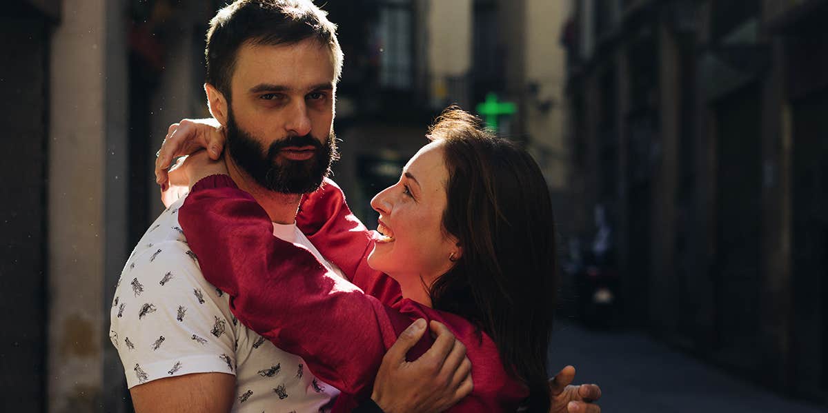 woman hugging man