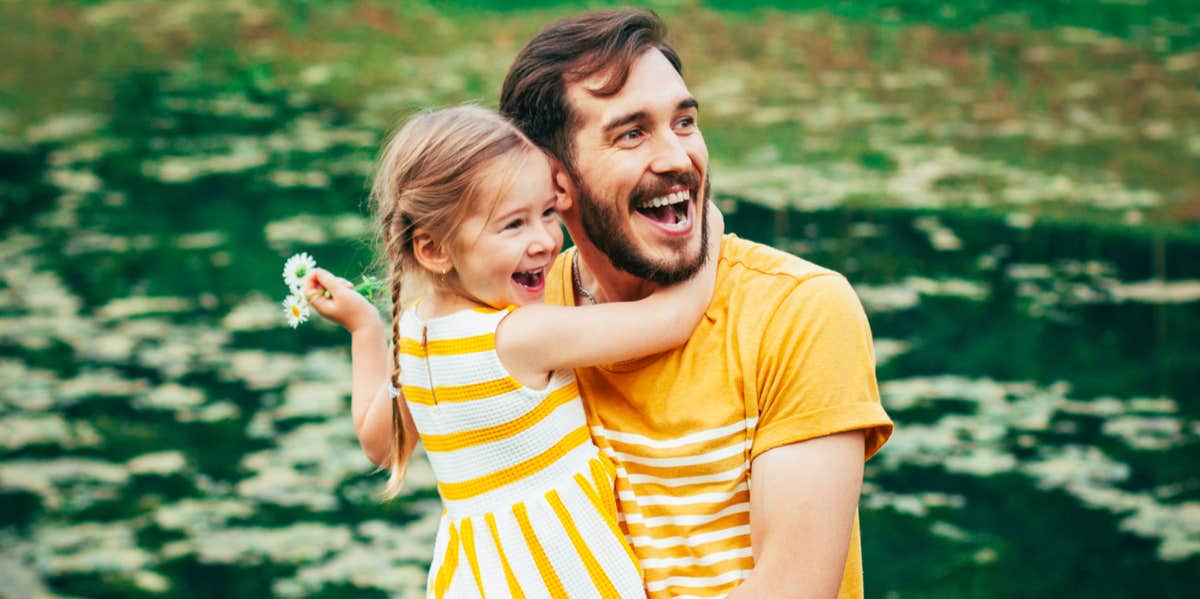 I Love My Daughter More Than My Husband — And He Knows It father holding daughter