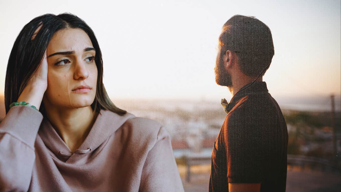 Woman looking stressed and man looking out over city 