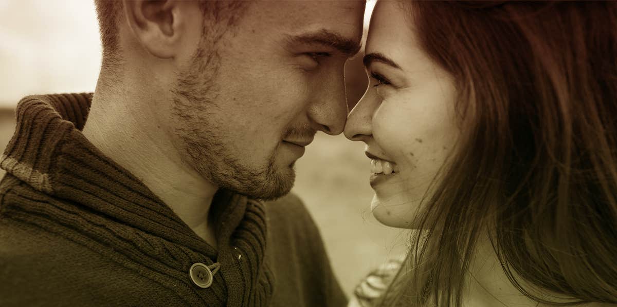 How A Devastating Diagnosis Led To Better Intimacy In My Marriage smiling couple embracing close