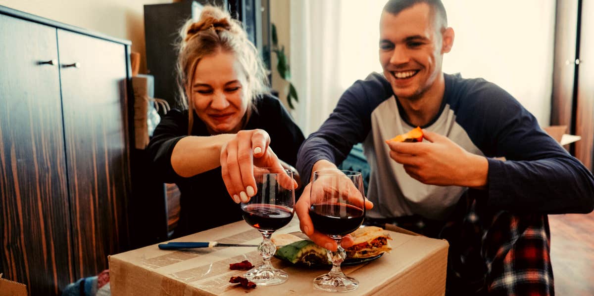 Low-Key Valentine’s Day Ideas That Are Totally Romantic couple celebrating a lowkey Valentine's Day