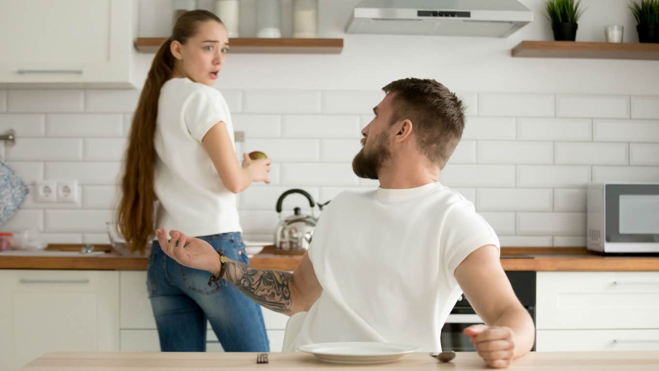 Man Thinks His Wife Is Taking Her Resentment Too Far After He Makes Fun Of Her Cooking — Now She Only Cooks For Herself And Their Kids man argues with his wife in the kitchen