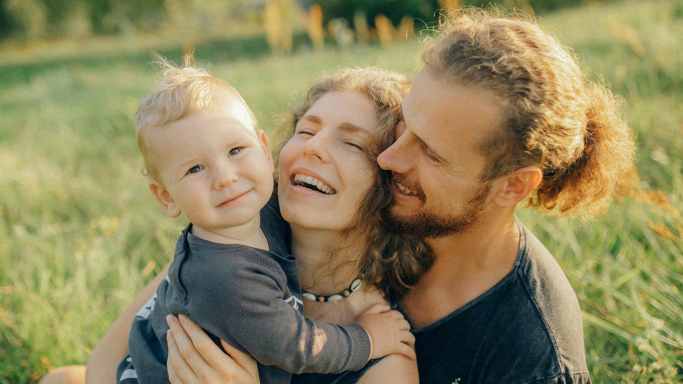 happy couple with baby