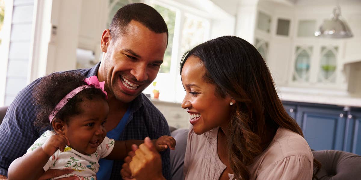 Man Missed His Daughter's Birth Because His Dad Wouldn't Give Him Time Off Work Couple with their baby