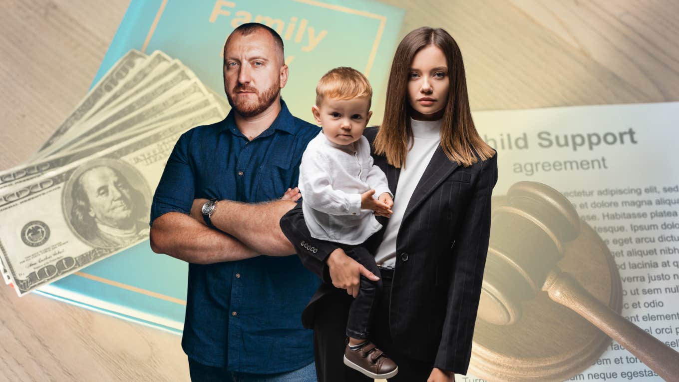 man with arms crossed and serious woman holding child