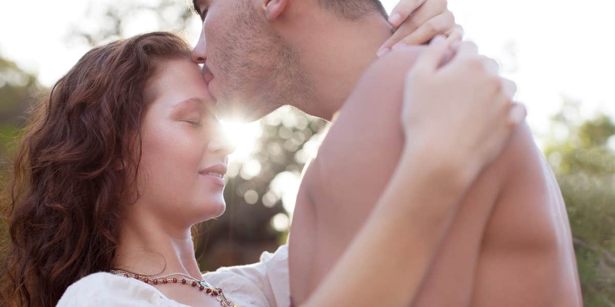 woman hugging man