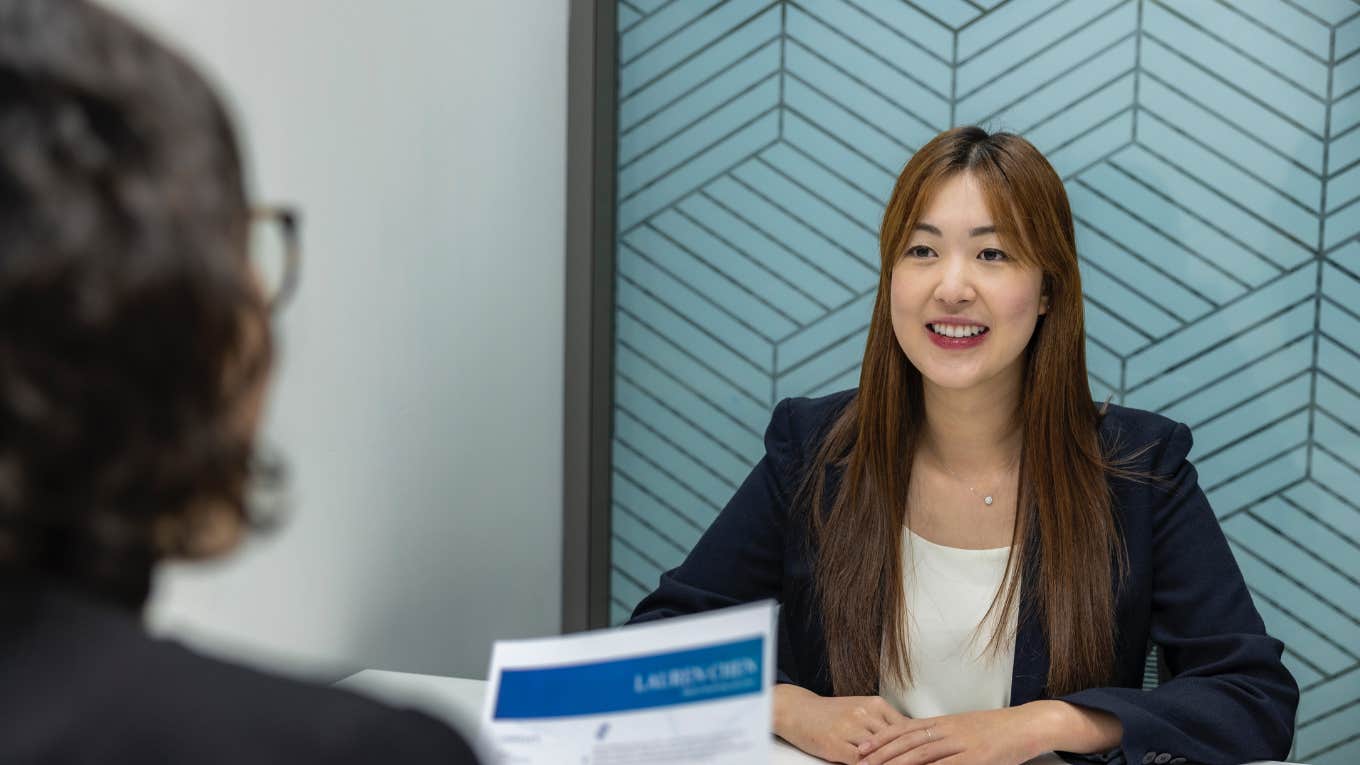 Man Sparks Debate After Arguing It's Perfectly Okay To Lie On Your Resume woman at a job interview