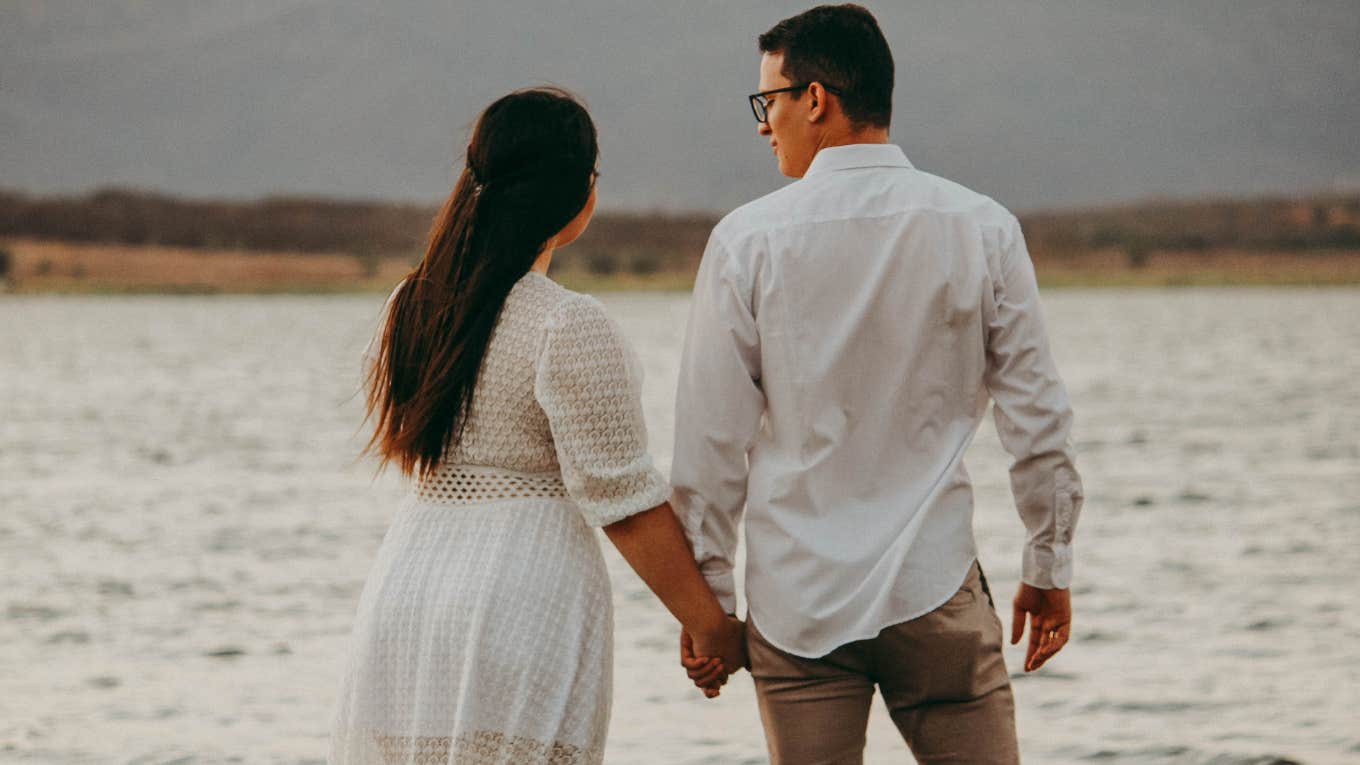 man walking with his girlfriend and his family criticized his girlfriend's weight