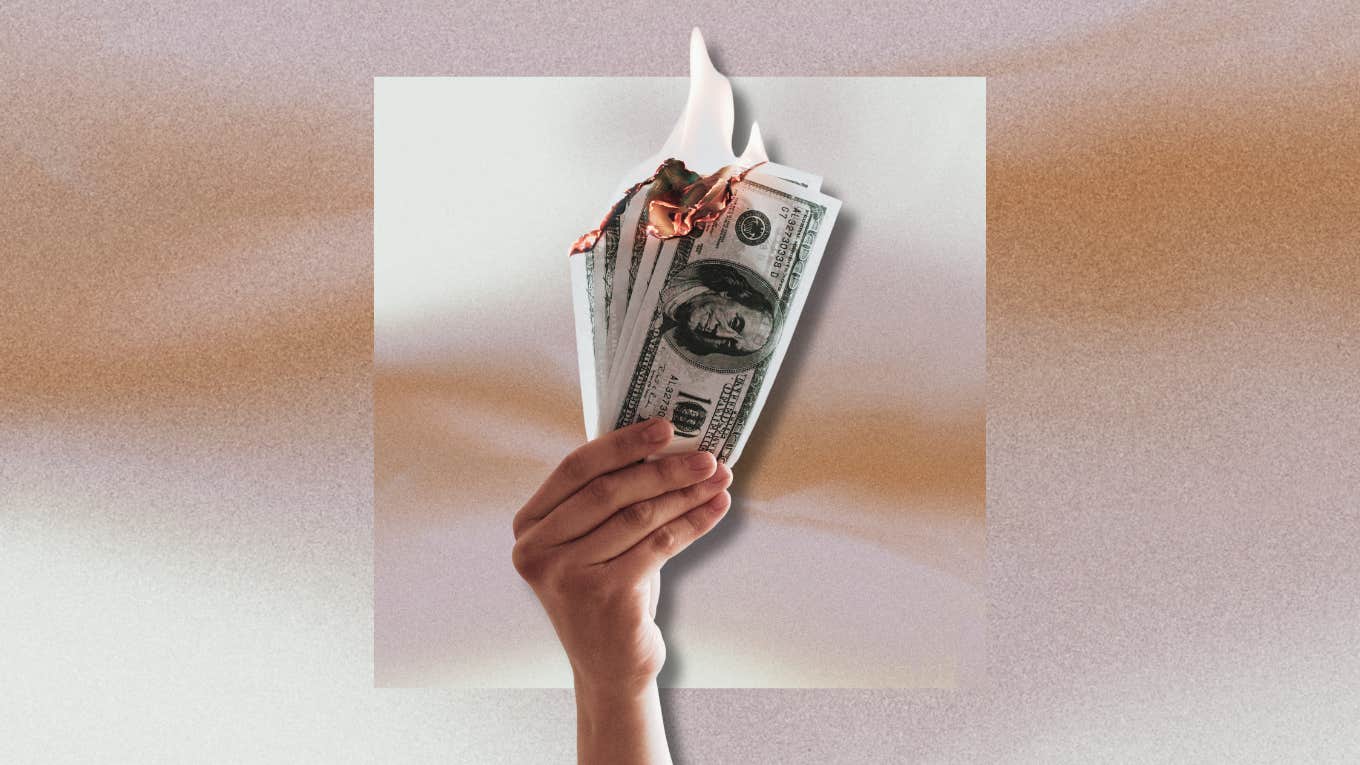 Man Threatens To Cut Son's College Fund If He Doesn't Come Visit hand holding up burning money