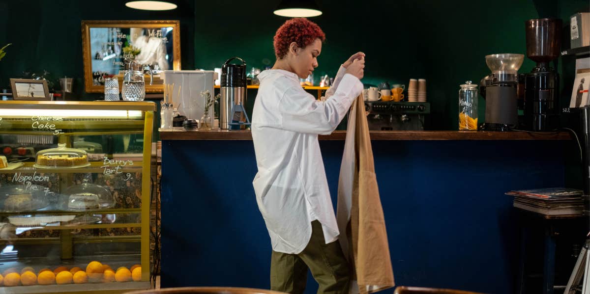 woman working at a cafe